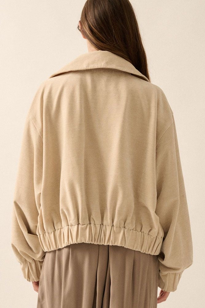 Oversized beige suede bomber jacket